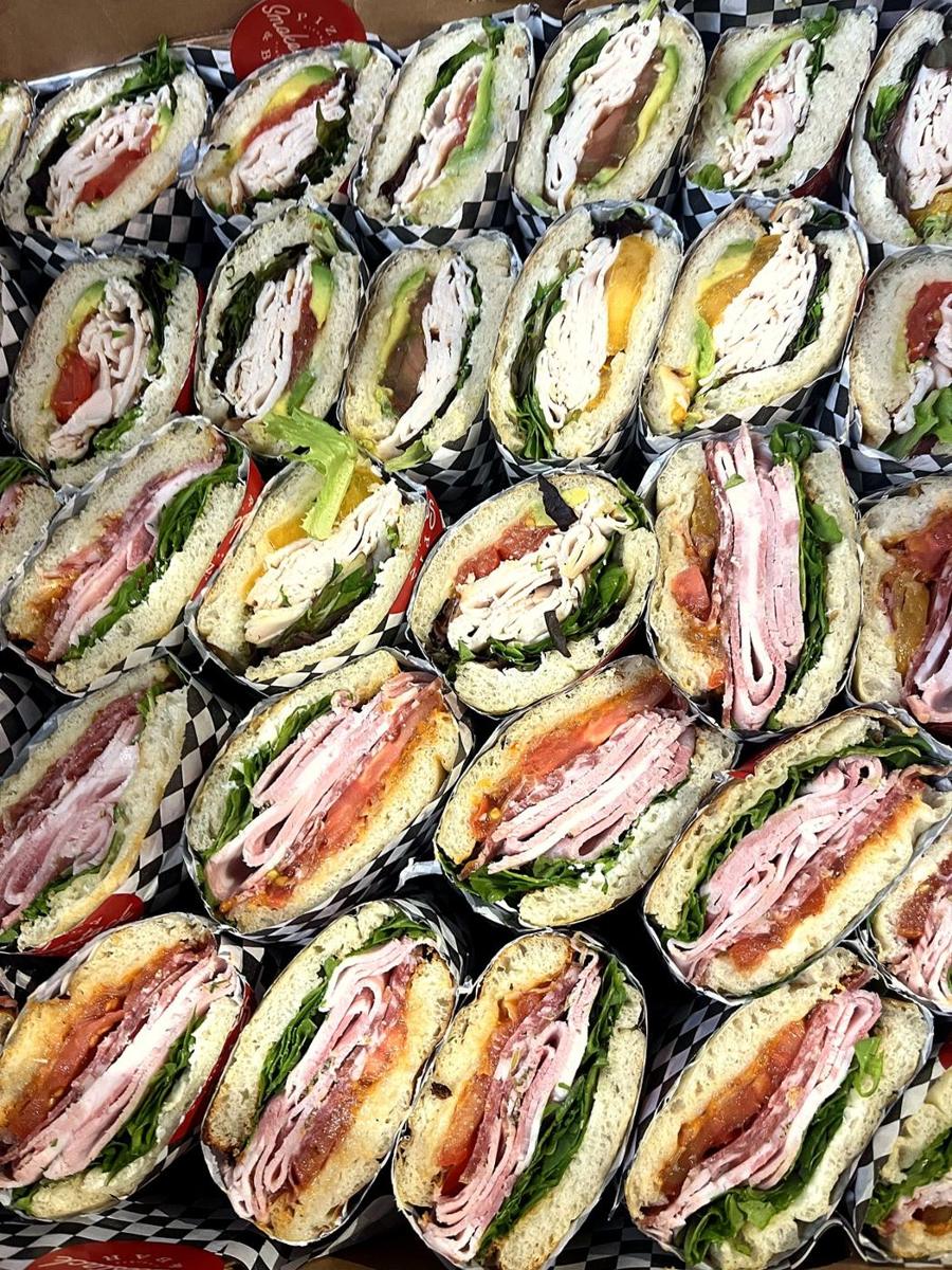 Catering box of sandwiches cut and wrapped